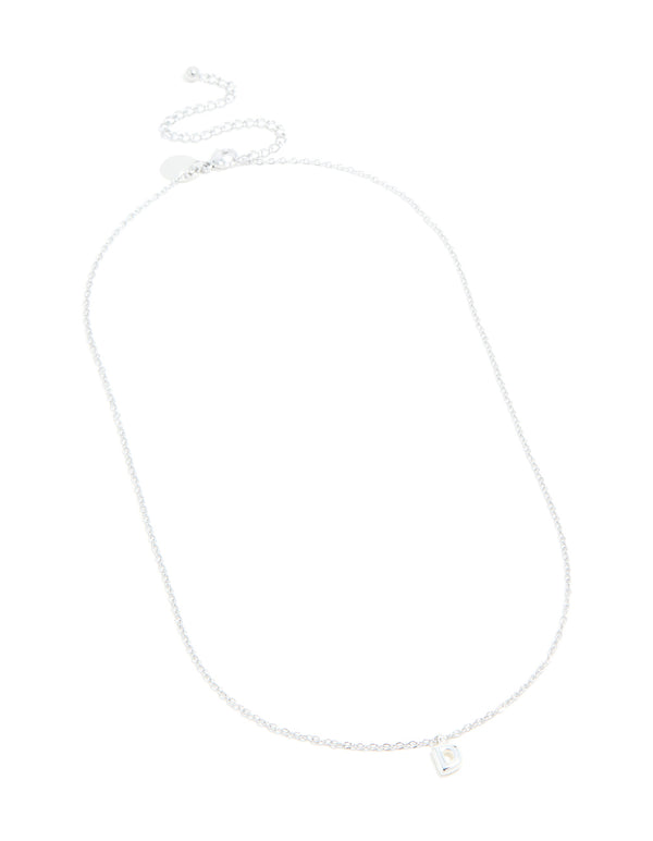 Crafted from waterproof stainless steel, mini bubble letter D necklace with initial featuring pendant in silver close up view