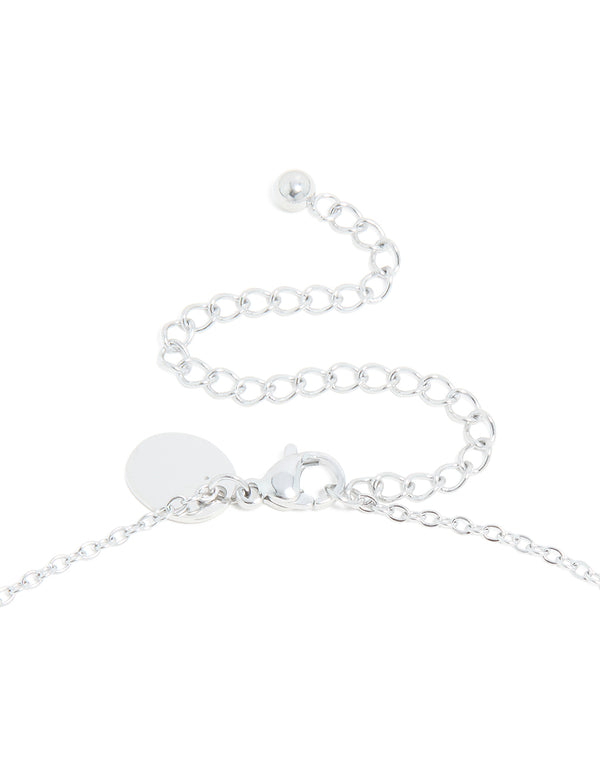 Designed with waterproof stainless steel, mini bubble letter D necklace featuring initial pendant in silver clasp detail view