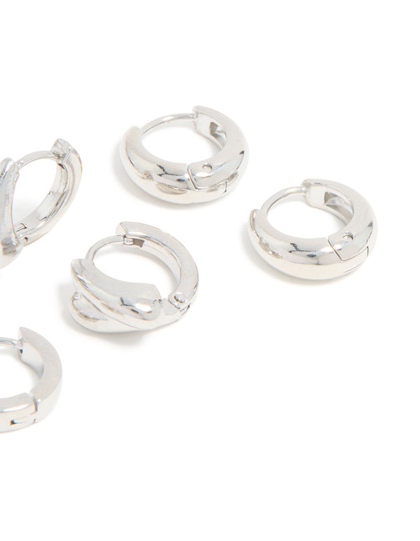 Showcasing chunky huggie earrings made from waterproof stainless steel in silver, displayed as a 3-pack post detail view
