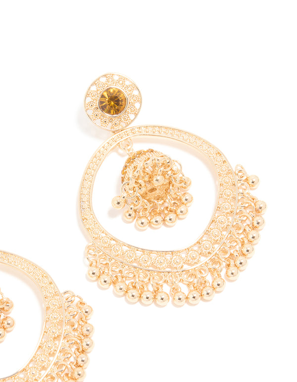 Crafted with gold circle boho drop earrings featuring beads and charm close up view