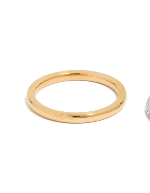 Detailed view of waterproof mixed plated thin stacking ring with cubic zirconia accents, made from stainless steel in gold tone side detail view