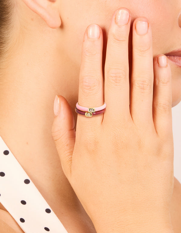 Showcasing waterproof gold plated stainless steel mini cubic zirconia enamel rings 2-pack on finger view