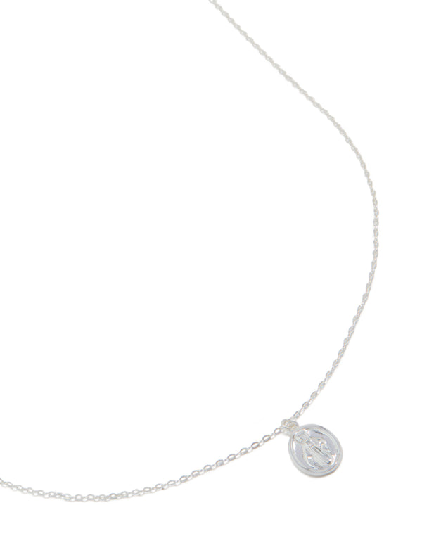 Beautifully crafted sterling silver round Mary pendant necklace with statement styling in silver close up view
