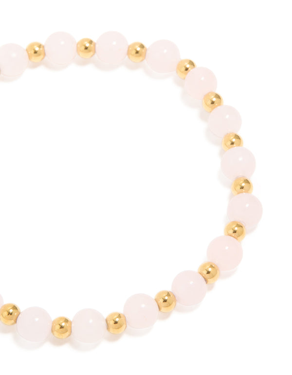 Designed with waterproof gold plated stainless steel and rose quartz beaded stretch bracelet close up view