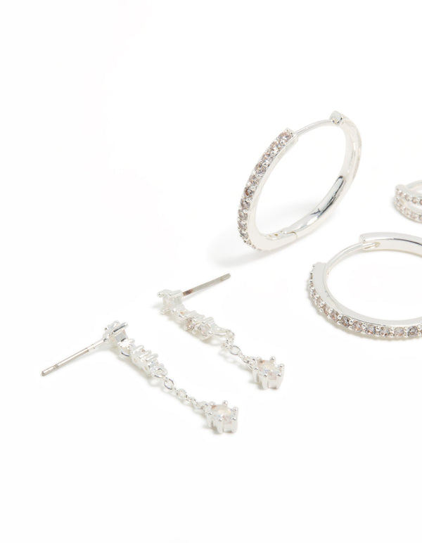 Featuring large hoop earrings with charm accents and cubic zirconia crystals on brass in a 4-pack set with multiple closure styles close up view