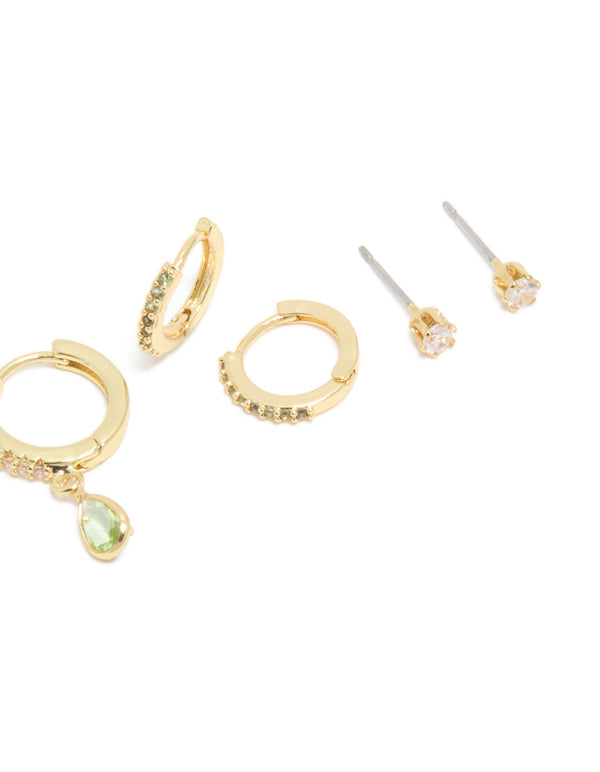 Featuring style brass peridot cubic zirconia august birthstone earrings 4-pack with huggie closureand ball stud, crafted from gold plated crystal in light green and clear post detail view