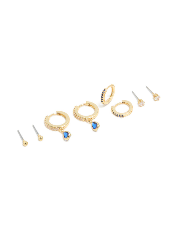Crafted from gold plated brass with charm details, featuring sapphire cubic zirconia crystals and ball stud, huggie closure in a 4-pack front view