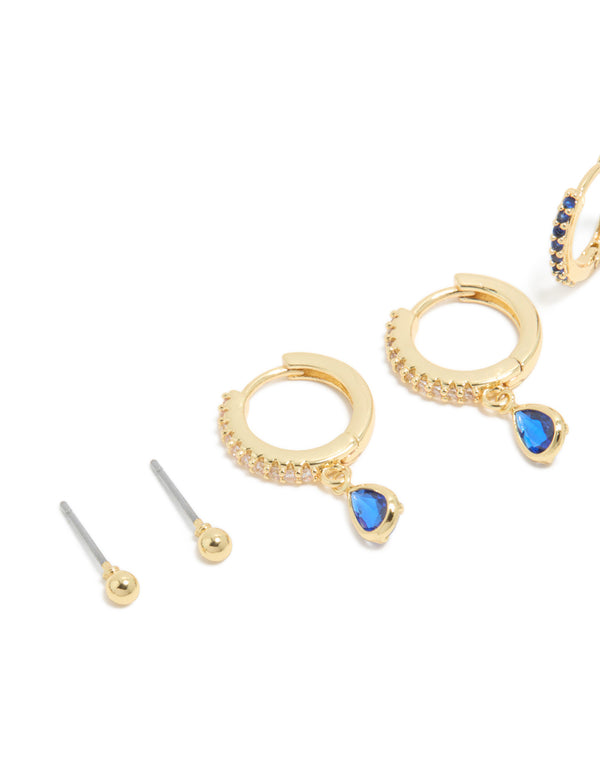 Featuring gold plated brass sapphire cubic zirconia September birthstone earrings with ball stud and huggie closure in a 4-pack close up view