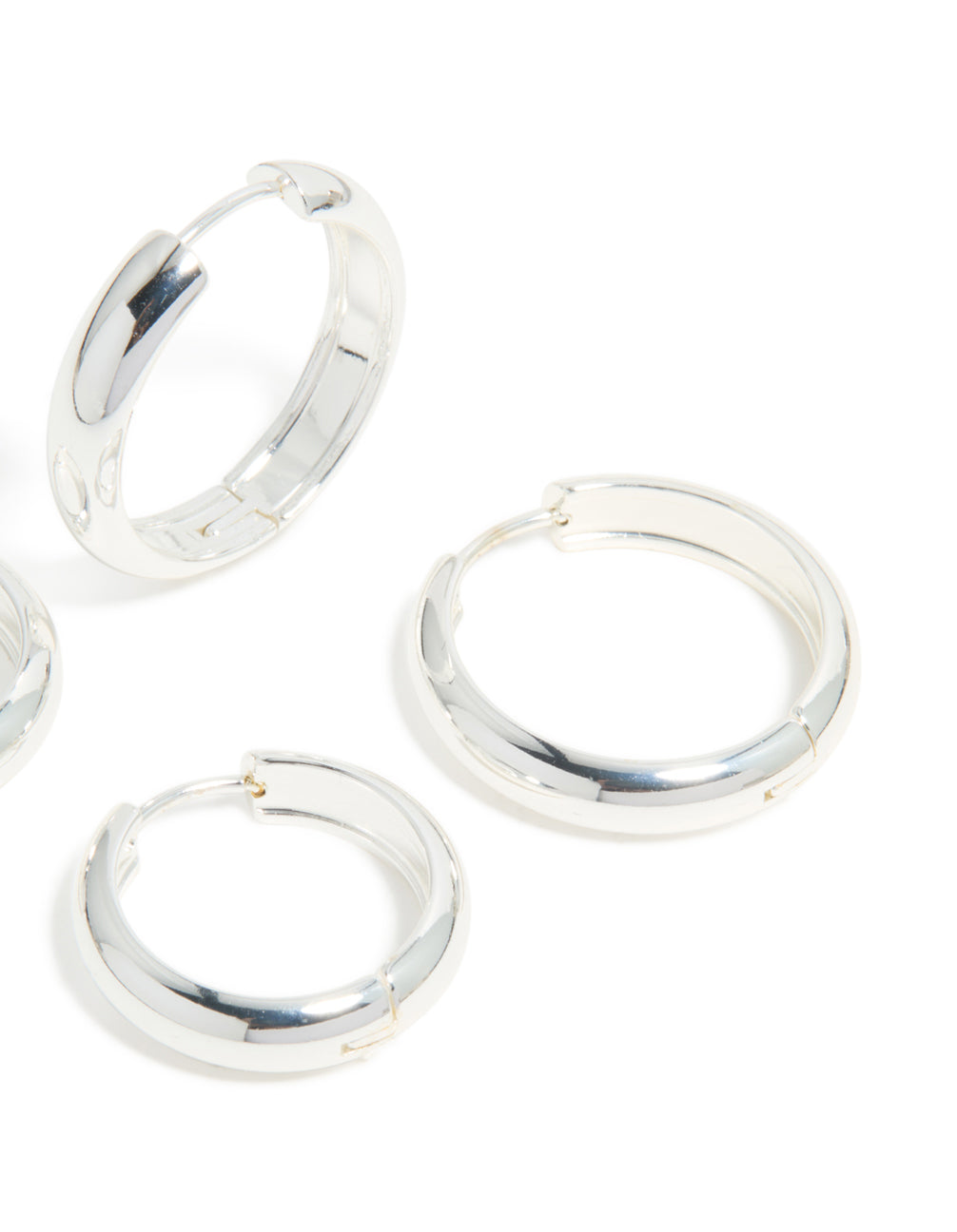 These elegant and chunky waterproof stainless steel thick hoop earrings in silver in a 2-pack with a post detail view