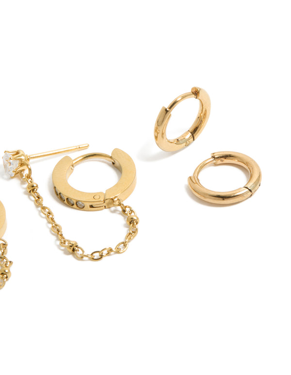 Designed with waterproof gold plated stainless steel studs and chain earrings 4-pack featuring charm details, cubic zirconia, huggie closures in white side detail view