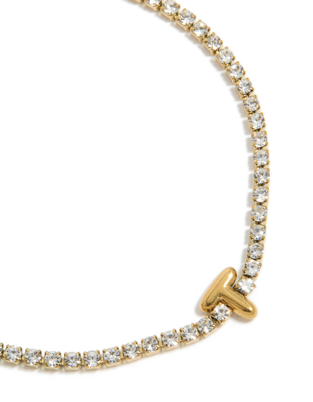 Highlighting a waterproof gold plated stainless steel cubic zirconia letter T initial tennis bracelet in close up view