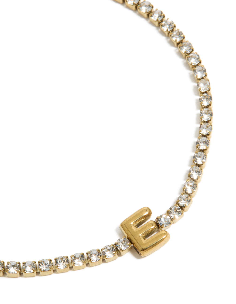 Detailed view of waterproof tennis bracelet with initial letter E, crafted from gold plated stainless steel featuring cubic zirconia in close up view
