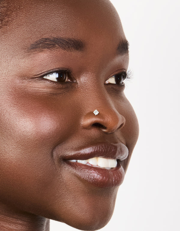 Discover titanium cubic zirconia threadless flat back nose studs with dainty styling nose view