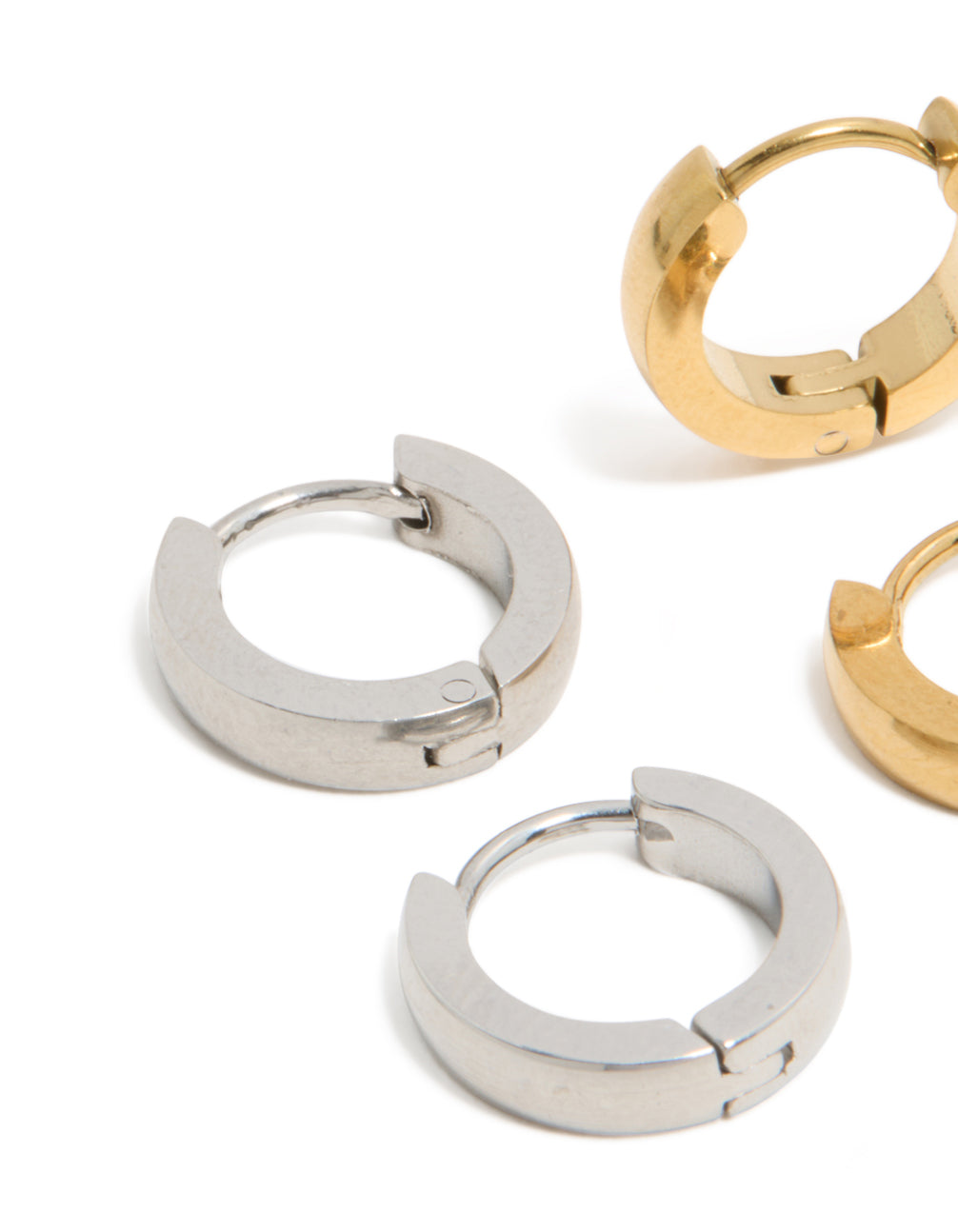 Crafted from waterproof mixed plated stainless steel, these huggie earrings 2-pack are in gold and silver close up view