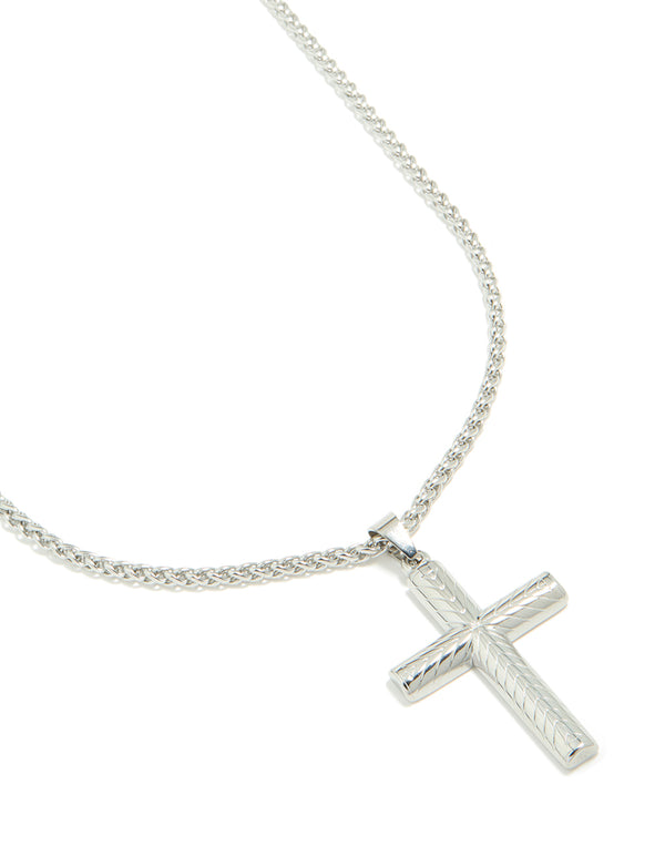 Showcasing a mens waterproof detailed cross pendant necklace crafted from stainless steel in silver close up view