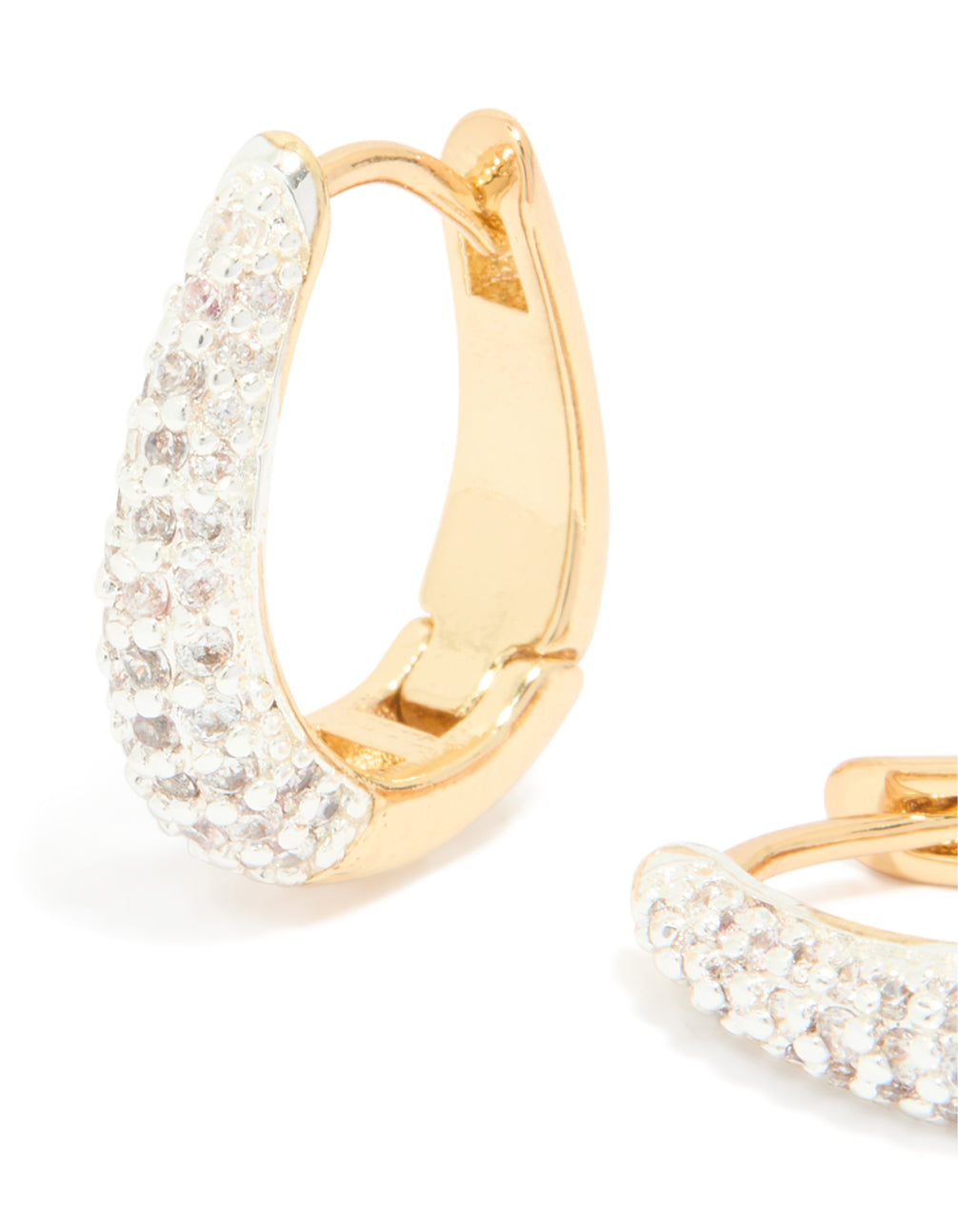 Highlighting mixed metal plated small cubic zirconia teardrop huggie earrings with hoop closure in gold close up view