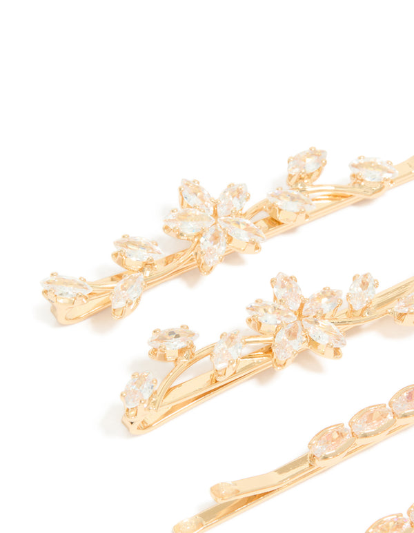 Crafted from cubic zirconia with floral design in gold, these clips are shown as a 4 pack detail view