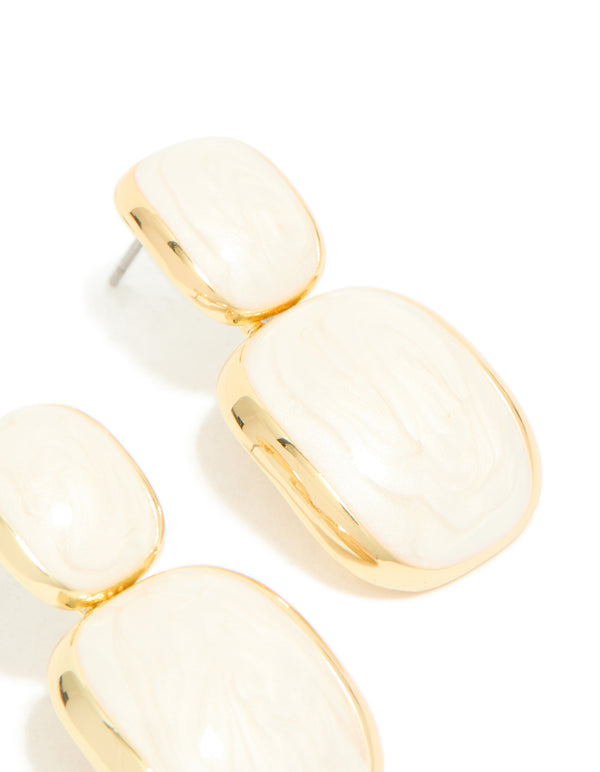 These gold plated cream enamel statement drop earrings highlight the post detail view