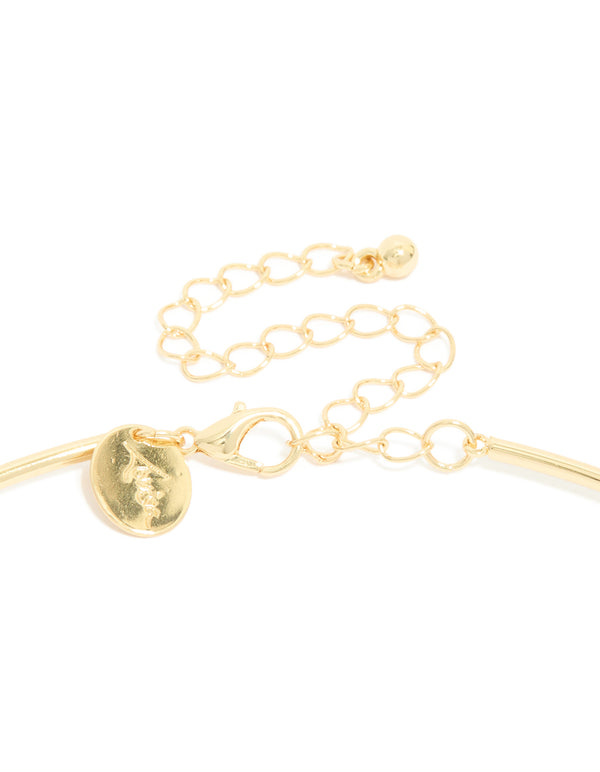 Elegantly designed gold plated torque necklace with cubic zirconia teardrop pendant in dainty statement style clasp detail view