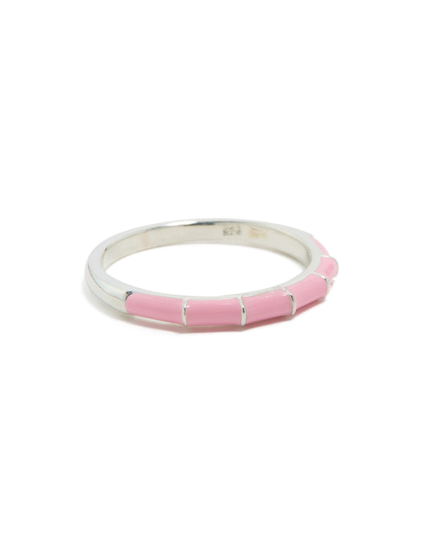 Featuring sterling silver pink enamel ring in light pink side detail view