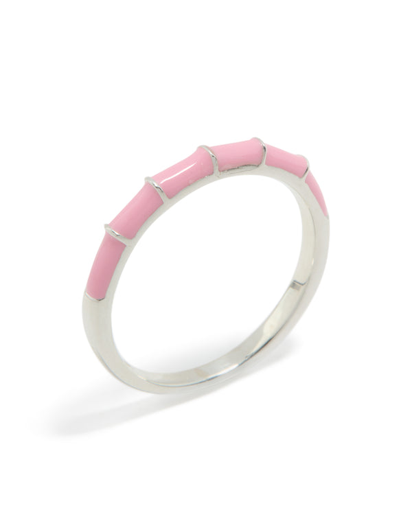 Designed with sterling silver and pink enamel in light pink close up view