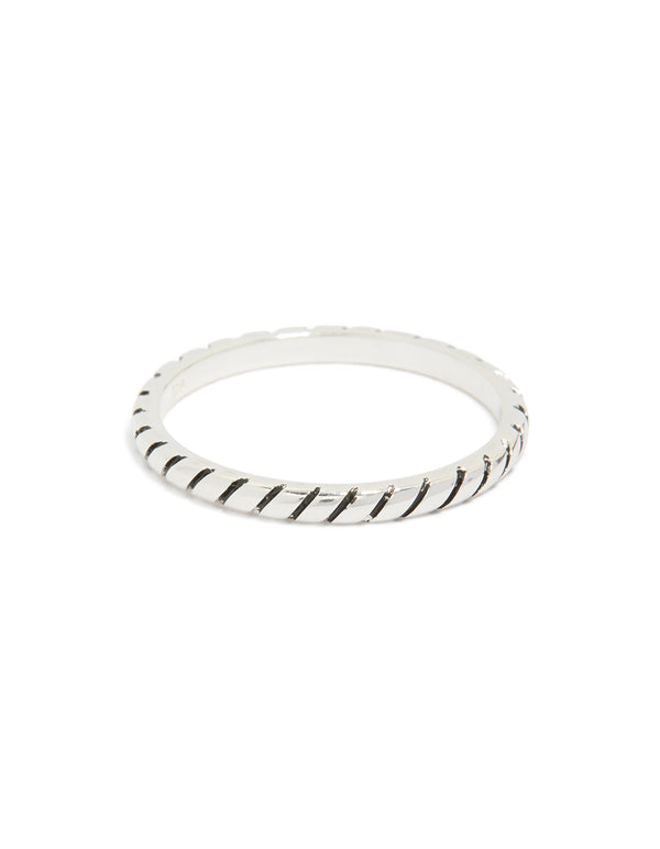 Featuring a textured black enamel ring in sterling silver with statement style front view