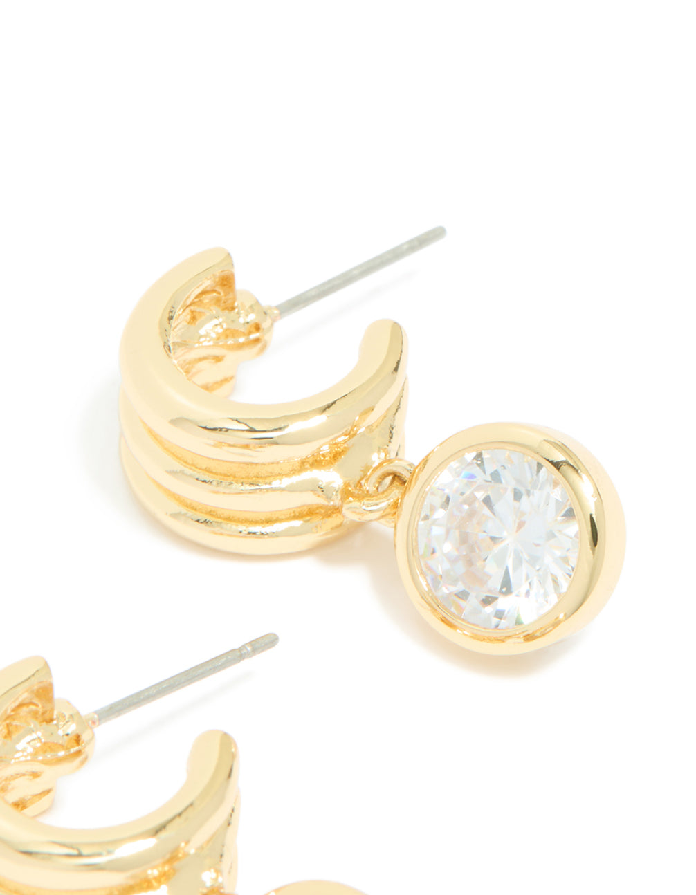 Highlighting gold plated cubic zirconia bezel line huggie earrings post detail view