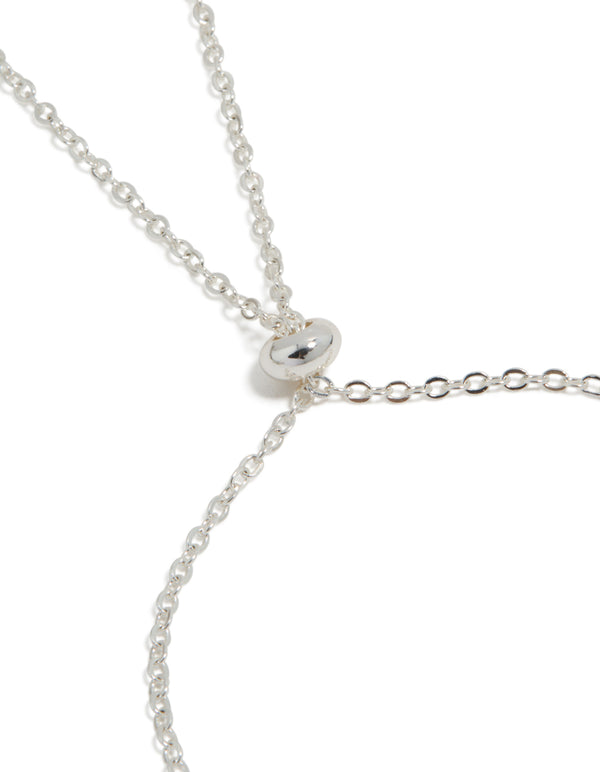 Designed with toggle functionality, this silver plated cubic zirconia pave starfish charm bracelet closure detail view