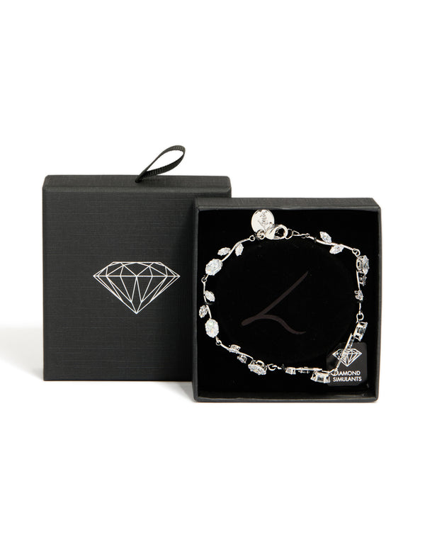 Detailed view of dainty vine bracelet featuring cubic zirconia stones in silver and clear with lobster clasp closure detail view