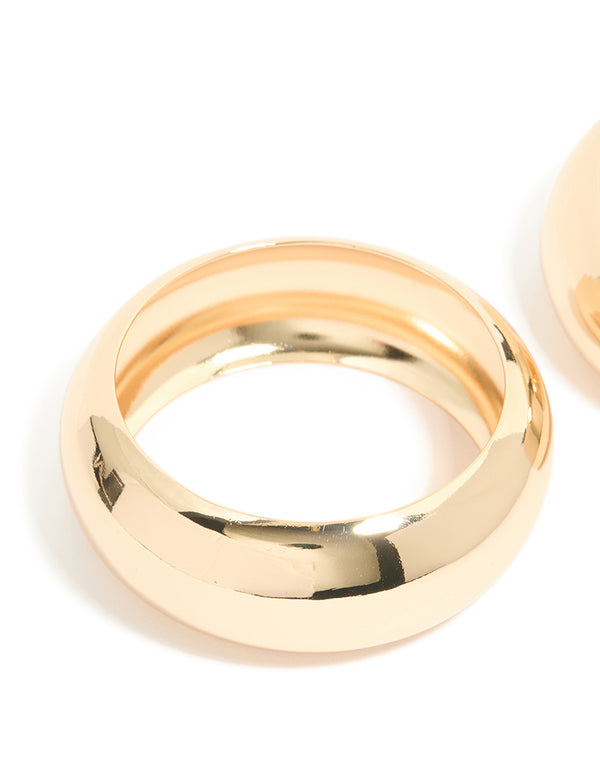 Featuring a 2-pack of gold oversized chunky statement bangles close up view