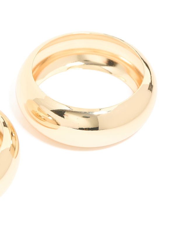 Featuring a 2-pack of gold oversized chunky statement bangles close up view