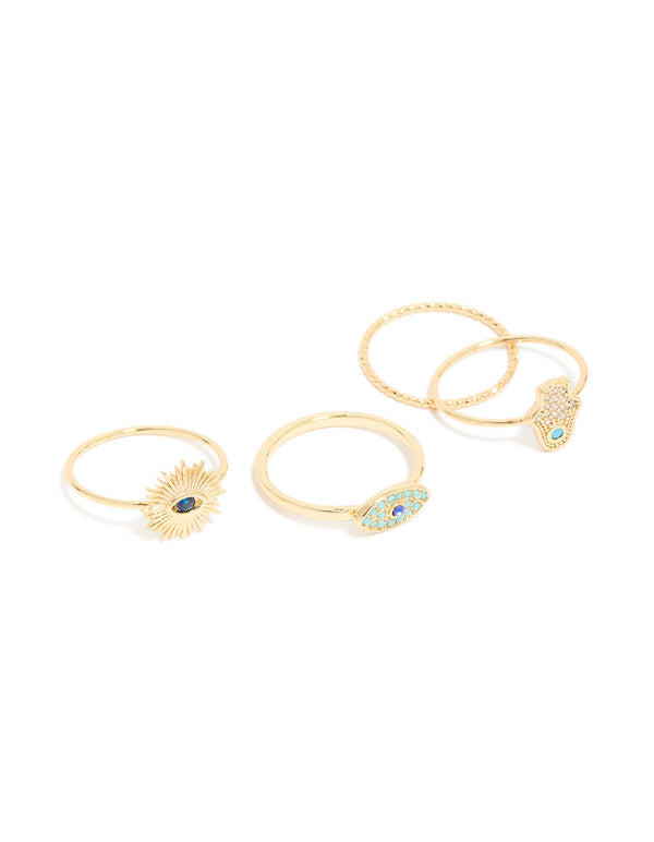 Showcasing a gold plated cubic zirconia evil eye and hamsa hand rings 4-pack featuring celestial sun motifs, crafted from crystal in statement style front view