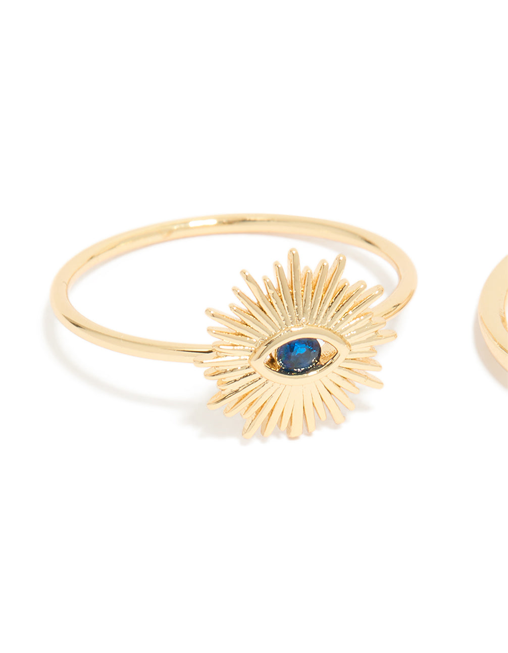 Crafted from gold plated cubic zirconia, this evil eye and hamsa hand rings 4-pack features celestial sun motifs in crystal and statement style side detail view