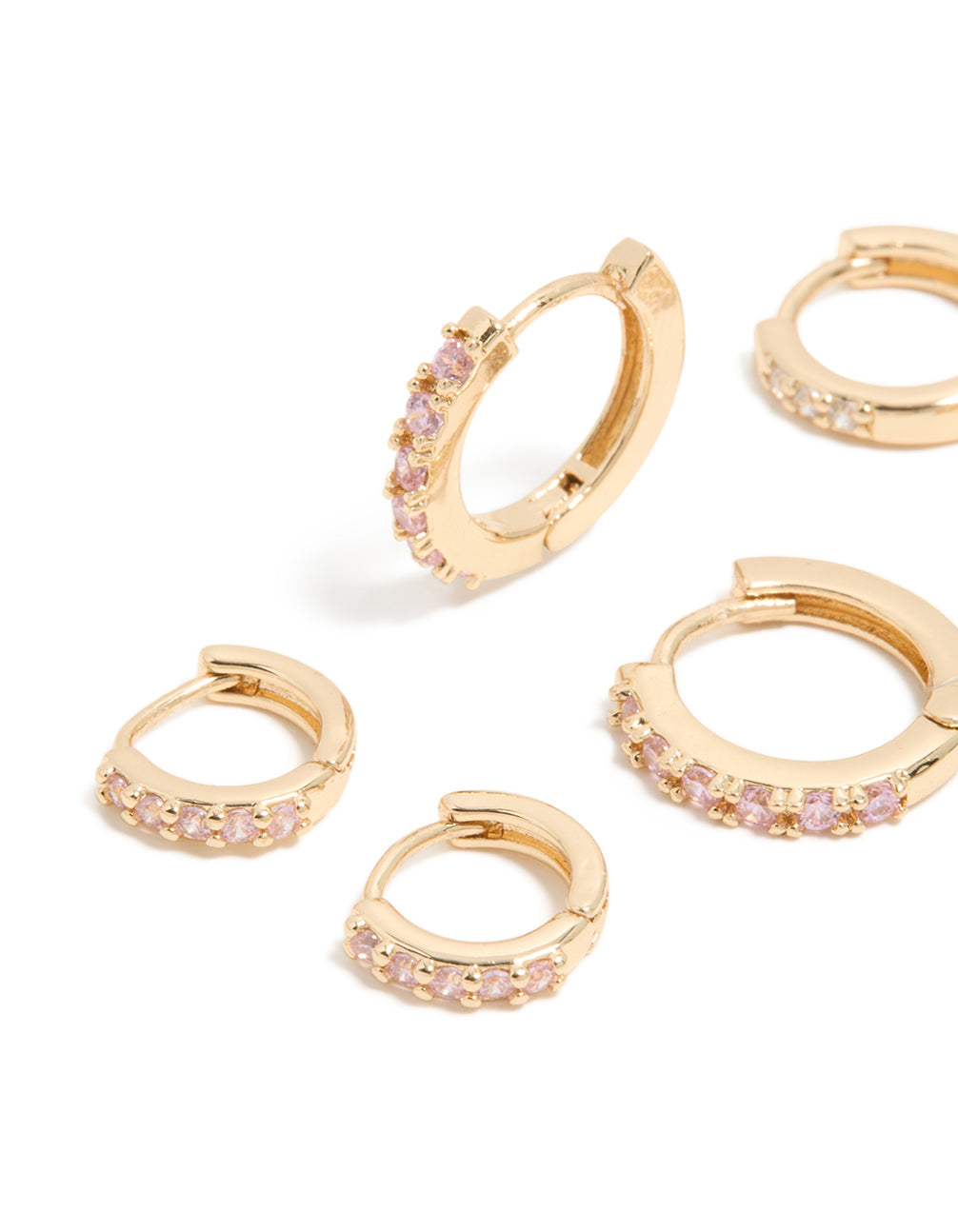 Designed with gold light pink cubic zirconia simple huggie earrings 3-pack close up view
