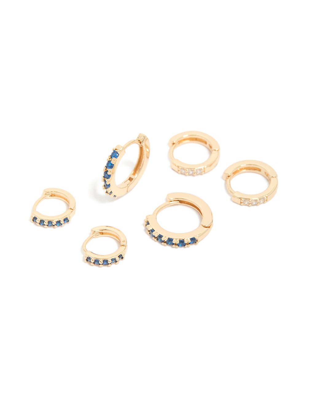Showcasing gold cubic zirconia huggie earrings with clear and sapphire stones in a 3-pack front view