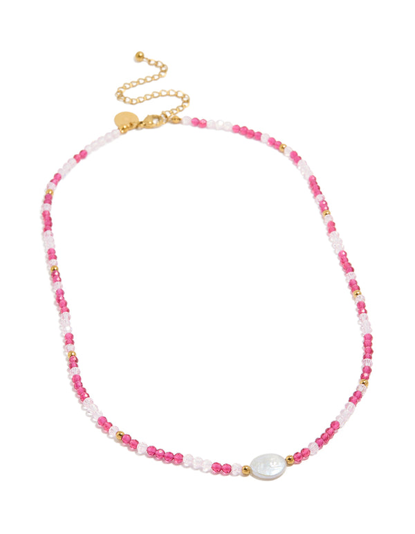 Crafted from waterproof gold plated stainless steel, this beaded necklace features pearl in white front view