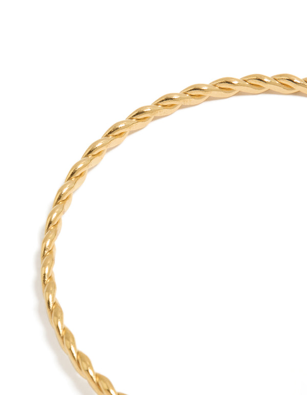 Showcasing waterproof gold plated stainless steel adjustable bangle with starfish charm, shell, ocean and pearl accents close up view