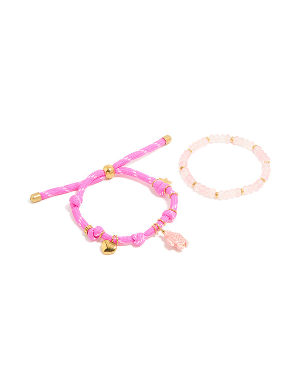 Featuring waterproof gold plated stainless steel semi precious stone and sea cord bracelets in a 2-pack with beads, heart and ocean charm, rose quartz accents, front view