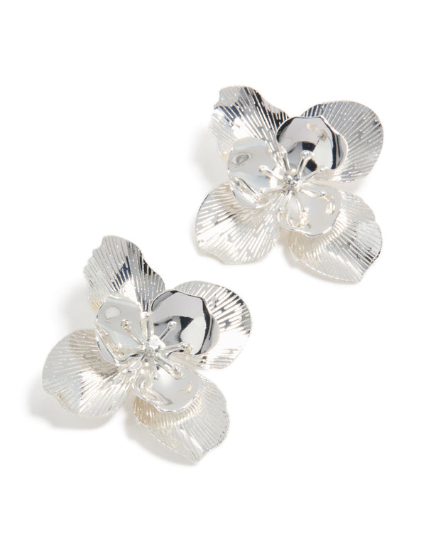Introducing silver diamante textured stud earrings featuring floral design front view