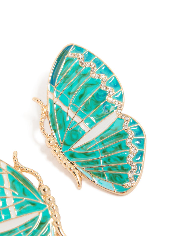 Highlighting dainty gold aqua enamel butterfly stud earrings featuring turquoise and clear stones post detail view