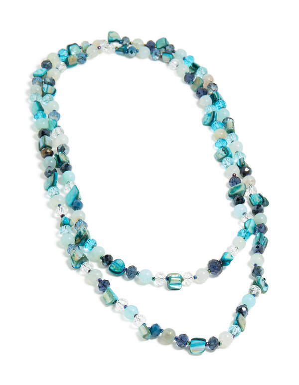 Designed with irregular double layered statement styling, featuring beads and ocean motifs in turquoise, navy, pale turquoise, and teal front view