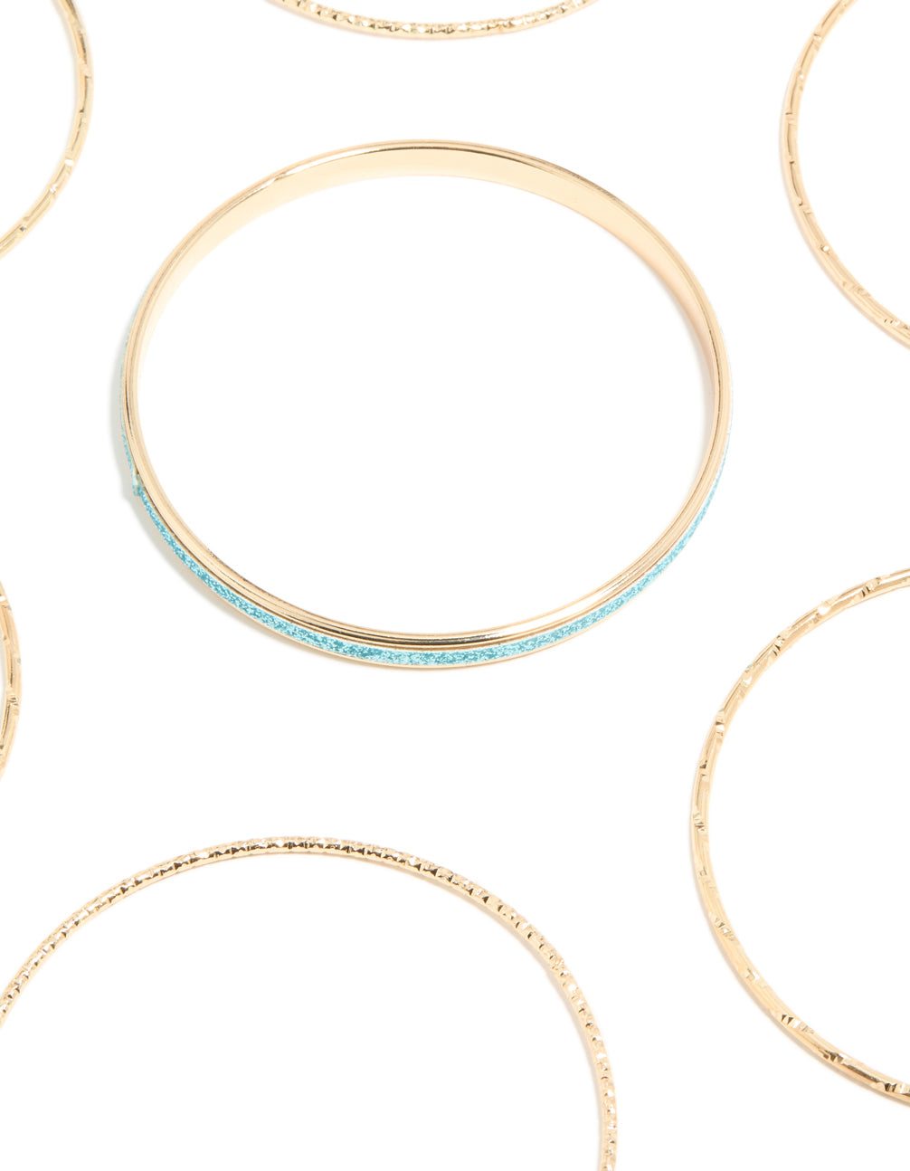 Featuring glitter bangles in gold with turquoise accents close up view