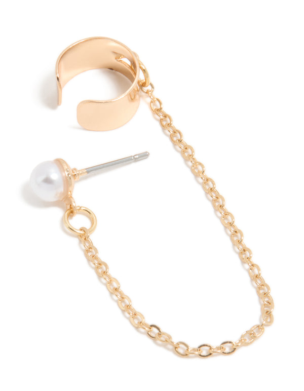 Showcasing a statement stud earring with gold chain ear cuff featuring pearl detail front view