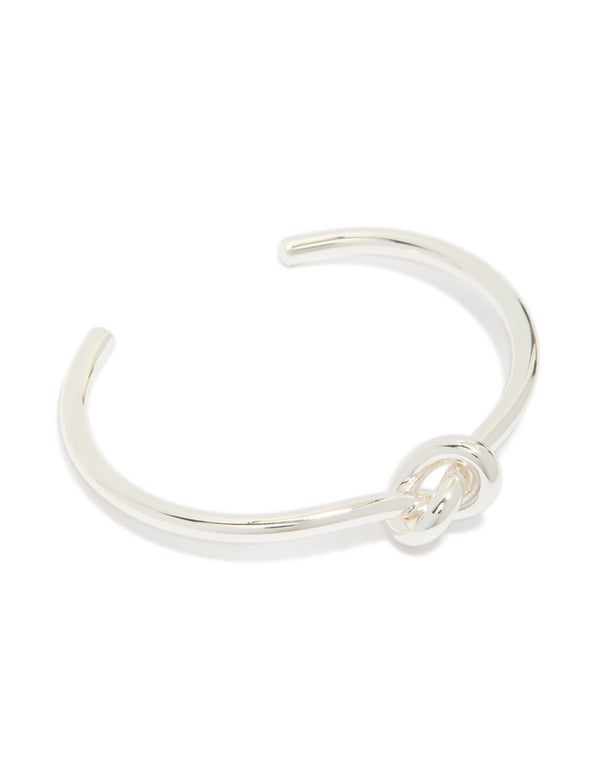 Showcasing a dainty wrist cuff bangle crafted from silver plated metal in a knotted design front view