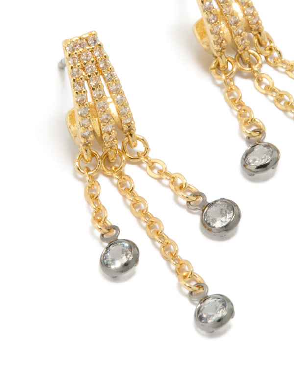Featuring mixed metal plated cubic zirconia illusion hoop chain drop earrings with statement design in gold, silver, and clear tones close up view