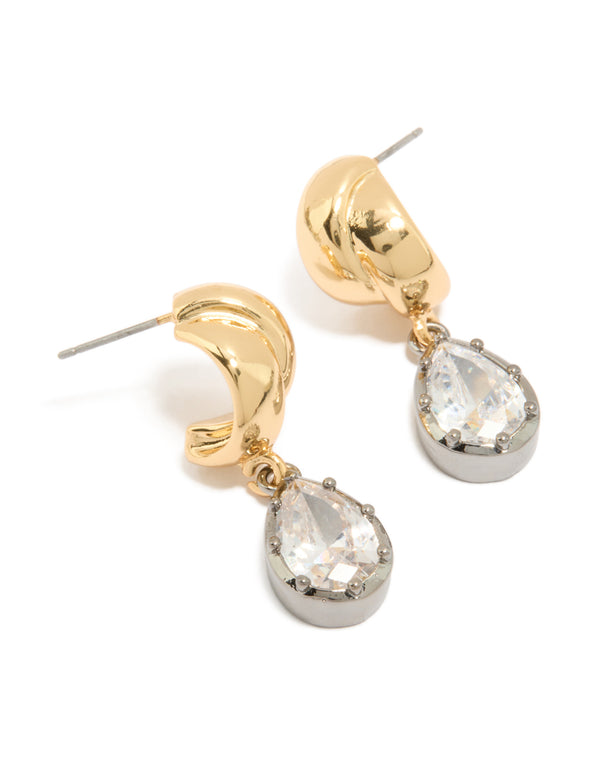 Showcasing mixed metal plated cubic zirconia knot teardrop earrings in gold and silver finish with clear stones front view