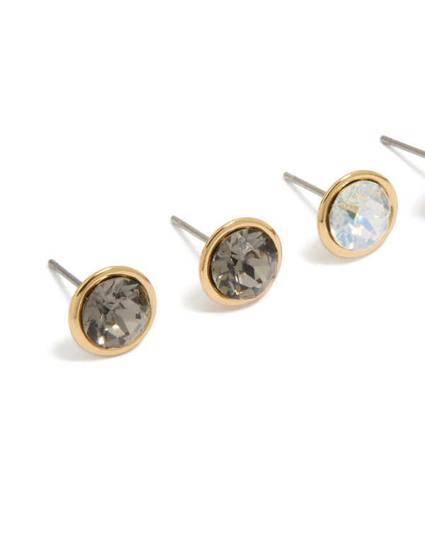 Showcasing gold plated cubic zirconia circle stud earrings in a 3-pack with crystal featuring stud closure close up view