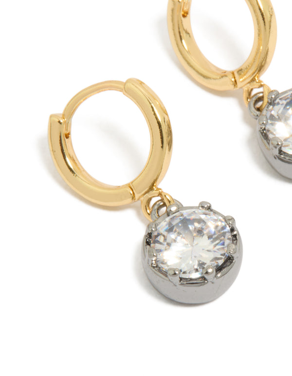 Beautifully crafted mixed metal plated cubic zirconia huggie drop earrings featuring gold and silver tones close up view