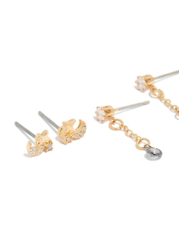 Explore mixed metal plated cubic zirconia cluster chain and stud earrings in a 4-pack featuring celestial star with gold and silver colors close up view