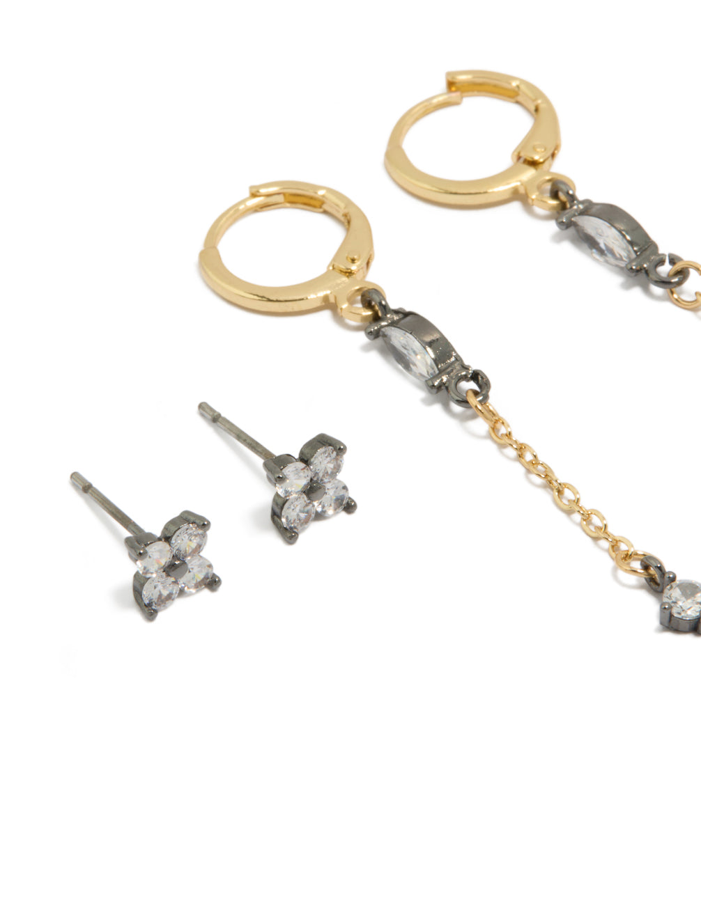 Designed with mixed metal cubic zirconia flower chain and huggie earrings in a 3-pack close up view
